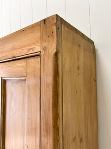 A Large English 19th Century Pine Coat Cupboard