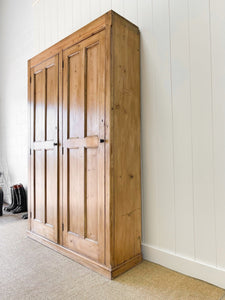 A Large English 19th Century Pine Coat Cupboard