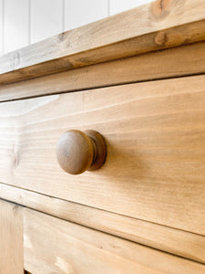 A Charming Pair of English Pine Nightstands with Bun Feet