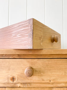 A Charming Pair of English Pine Nightstands with Bun Feet