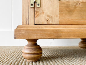 A Charming Pair of English Pine Nightstands with Bun Feet