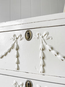 An Antique English Country House Chest of Drawers