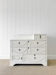 An Antique English Country House Chest of Drawers