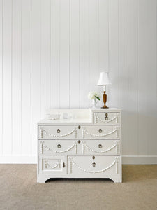 An Antique English Country House Chest of Drawers