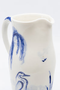 A Vintage English Blue and White Hand-painted Pitcher with Heron in Pond