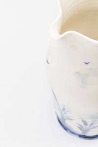 A Vintage English Blue and White Hand-painted Pitcher with Heron in Pond