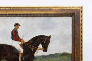 A Small Pair of Early 19th Century English Horse and Jockey Paintings