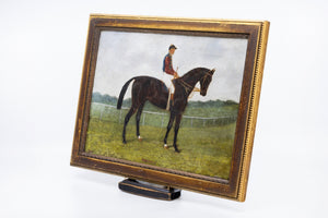 A Small Pair of Early 19th Century English Horse and Jockey Paintings