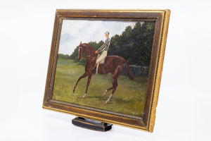 A Small Pair of Early 19th Century English Horse and Jockey Paintings