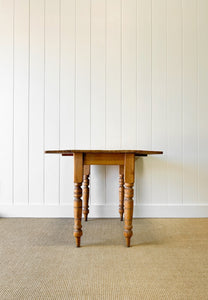 An English Country Pine Dining or Pembroke Drop Leaf Table