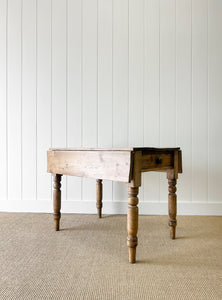 An English Country Pine Dining or Pembroke Drop Leaf Table