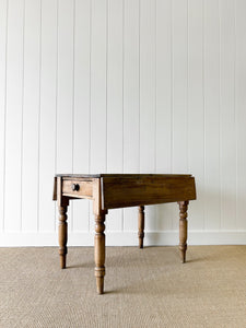 An English Country Pine Dining or Pembroke Drop Leaf Table