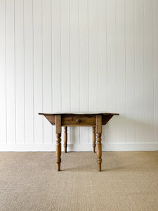 An English Country Pine Dining or Pembroke Drop Leaf Table