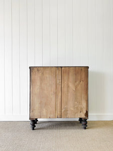 An Ebonized Antique English Chest of Drawers/Dresser