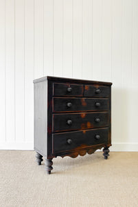 An Ebonized Antique English Chest of Drawers/Dresser