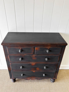 An Ebonized Antique English Chest of Drawers/Dresser