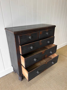 An Ebonized Antique English Chest of Drawers/Dresser