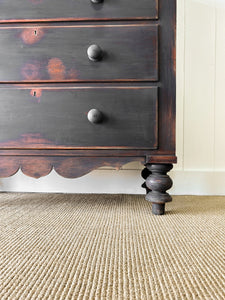 An Ebonized Antique English Chest of Drawers/Dresser