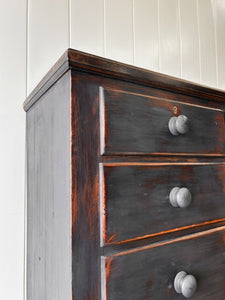 An Ebonized Antique English Chest of Drawers/Dresser