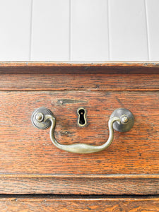 A English Georgian Oak Chest of Drawers with Swan Neck Hardware