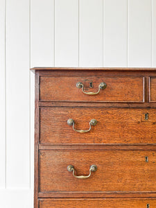 A English Georgian Oak Chest of Drawers with Swan Neck Hardware