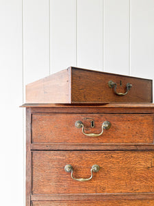 A English Georgian Oak Chest of Drawers with Swan Neck Hardware