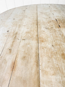 An Antique Pine Oval Drop Leaf Kitchen Dining Table with Spoon Feet