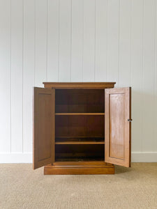 A Handsome English 19th Century Faux Painted Pine Cupboard