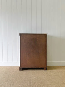 A Handsome English 19th Century Faux Painted Pine Cupboard