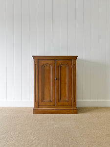 A Handsome English 19th Century Faux Painted Pine Cupboard