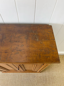 A Handsome English 19th Century Faux Painted Pine Cupboard