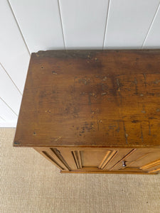 A Handsome English 19th Century Faux Painted Pine Cupboard