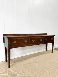 An Antique English 7 ft George III English Country Oak Hall Table or Sideboard