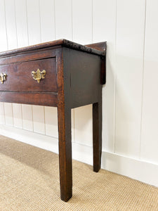 An Antique English 7 ft George III English Country Oak Hall Table or Sideboard