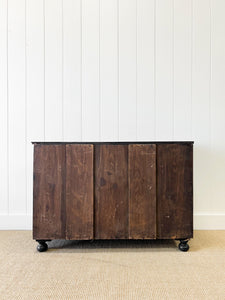 An Ebonized Antique English Chest of Drawers with Campaign Brasses c1890