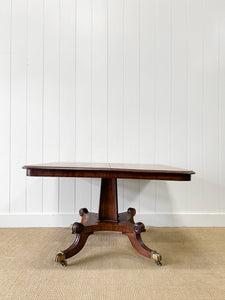 An English Mahogany Breakdast Table with Castors