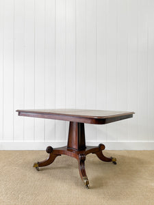 An English Mahogany Breakdast Table with Castors