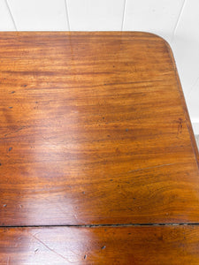 An English Mahogany Breakdast Table with Castors