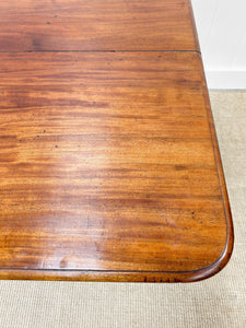 An English Mahogany Breakdast Table with Castors