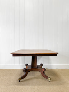 An English Mahogany Breakdast Table with Castors