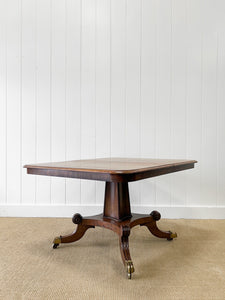 An English Mahogany Breakdast Table with Castors