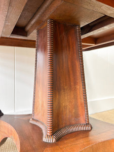 An English Mahogany Breakdast Table with Castors