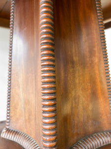 An English Mahogany Breakdast Table with Castors