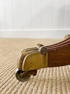 An English Mahogany Breakdast Table with Castors