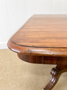 An English Mahogany Breakdast Table with Castors