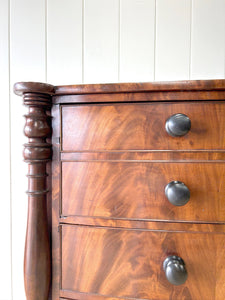 A Large Antique English Bow Front Mahogany Chest of Drawers